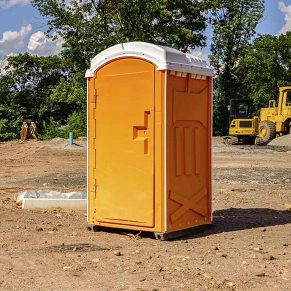 how often are the portable restrooms cleaned and serviced during a rental period in Sawyer MI